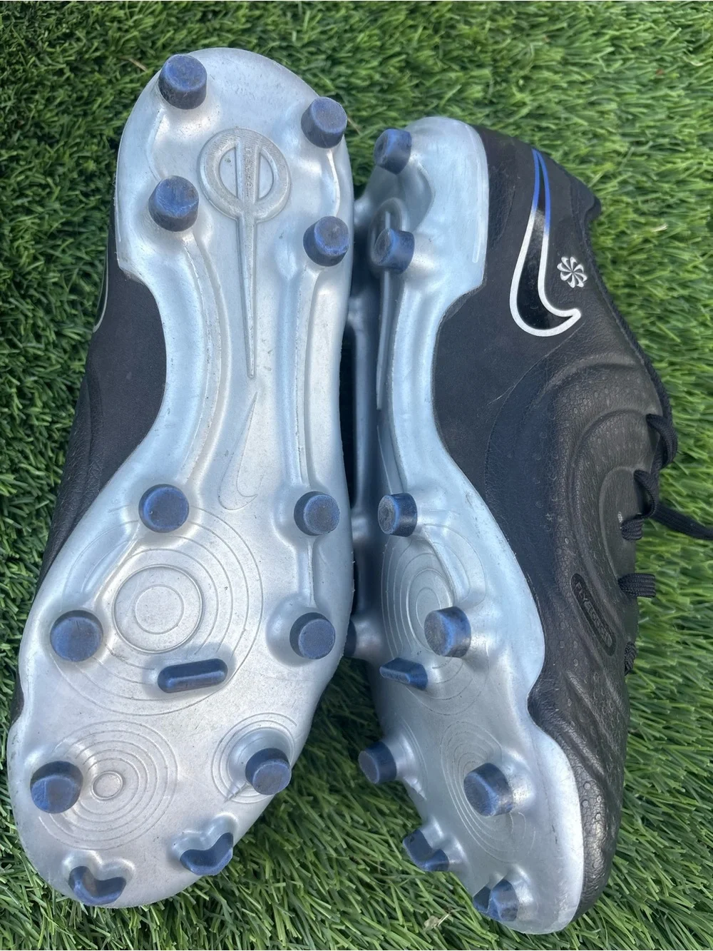 Nike Kids Black Soccer Cleats with Blue Accents